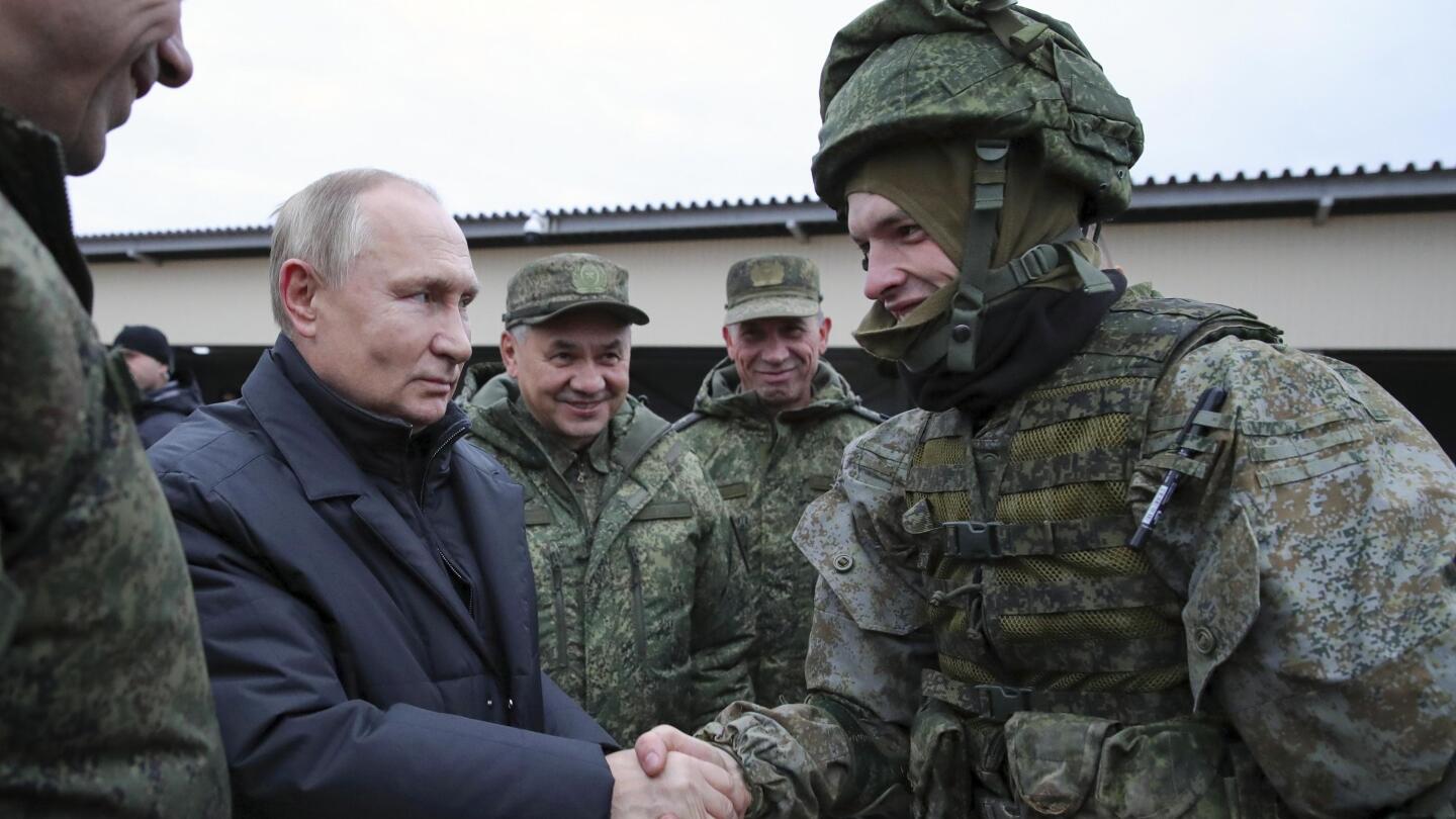 Russia's chaotic draft leaves some out in cold, without gear | AP News